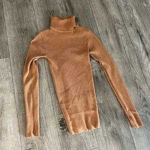 Camel turtleneck. Size medium.